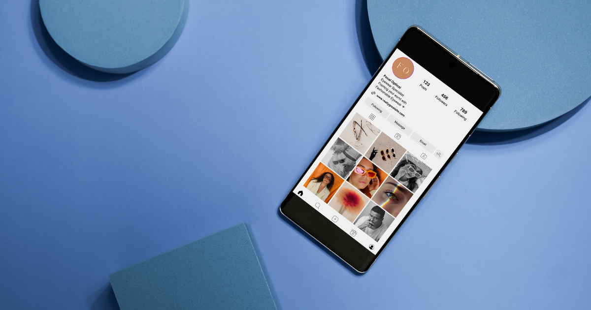 Smartphone displaying Instagram profile for small business social media marketing strategy